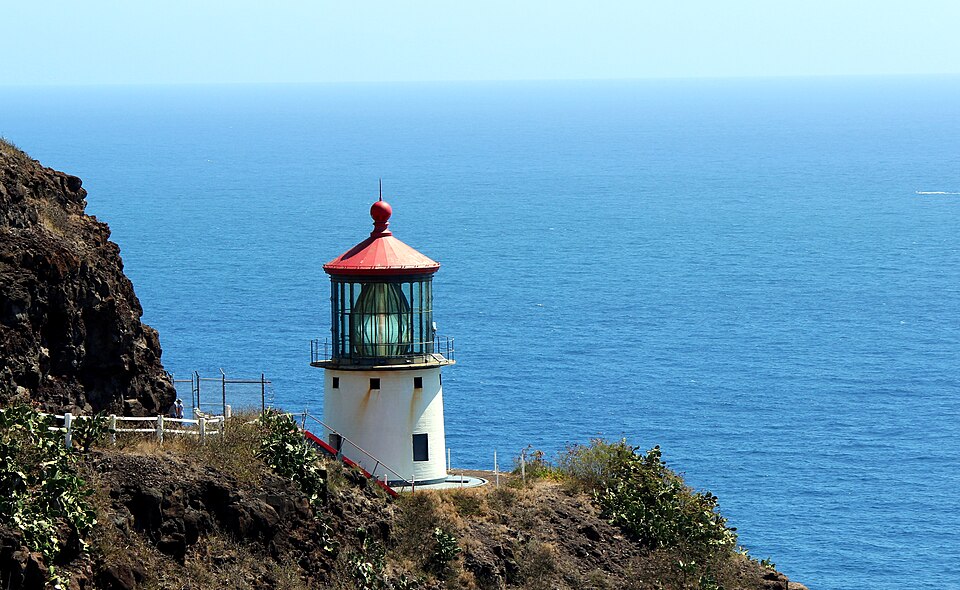 Makapuʻu lighthouse and bright blue Pacific coastline on Oʻahu